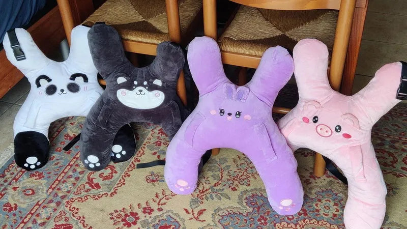 Four SnuggoWays lined up on a rug, a customer photo
